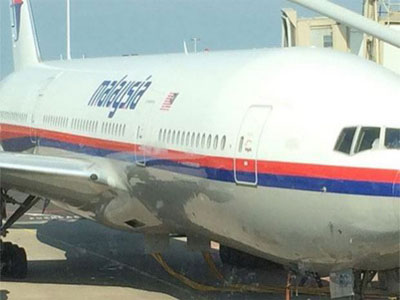 آخرین تصویر از هواپیمای مالزی سرنگون شده (+عکس)