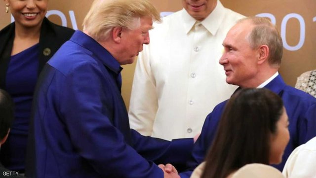 دست دادن پوتین و ترامپ در نشست اپک با یکدیگر (+عکس)
