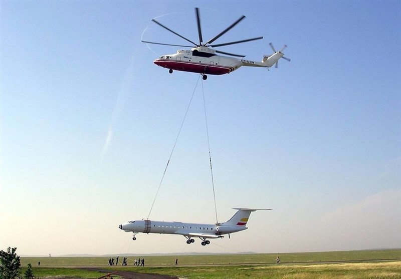 هلیکوپتری که هواپیما حمل می‌کند (عکس)