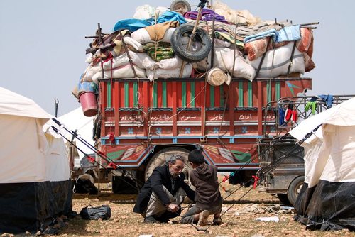 آوارگان سوری گریخته از شهر رقه در اردوگاه اسکان آوارگان در منبج