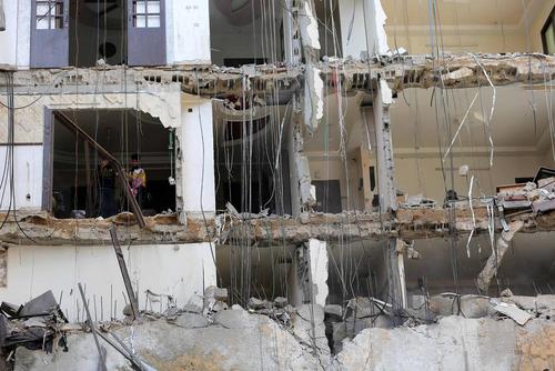 ساختمان های آسیب دیده از حملات هوایی اخیر اسراییل به نوار غزه/APA