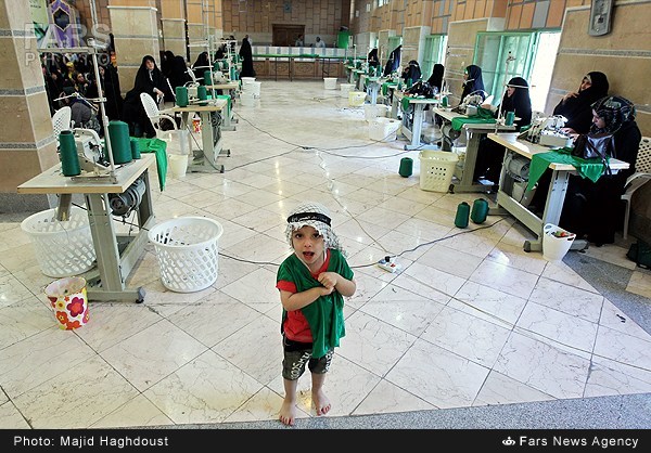 کارگاه دوخت لباس شیرخوارگان حسینی در تهران (عکس)