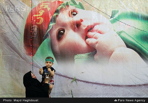 کارگاه دوخت لباس شیرخوارگان حسینی در تهران (عکس)