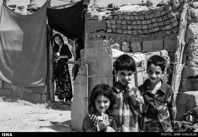 زندگی سیاه و سفید کودکان حلبی‌آباد - تهران (عکس)