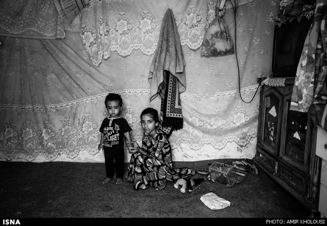 زندگی سیاه و سفید کودکان حلبی‌آباد - تهران (عکس)