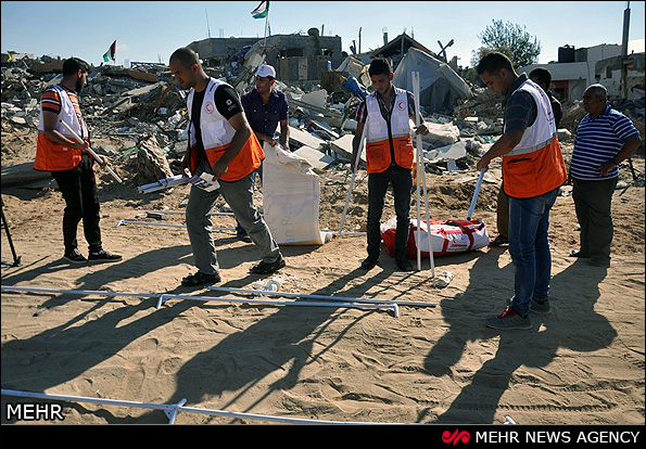 توزیع چادرهای هلال‌احمر ایران در غزه (عکس)