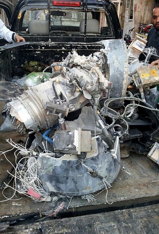 لاشه‌ هواپیما آمریکا در دست داعش (عکس)
