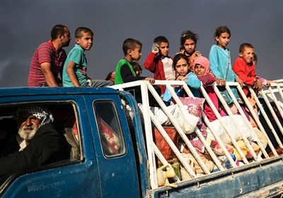مردمی که از دست داعش فرار کردند (+عکس)