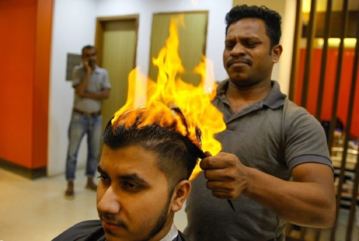 ترفند خطرناک آرایشگر مرد برای حالت دادن به مو (فیلم)