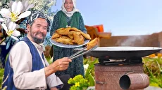 غذای روستایی در افغانستان و پخت سمبوسه سنتی توسط زوج مسن