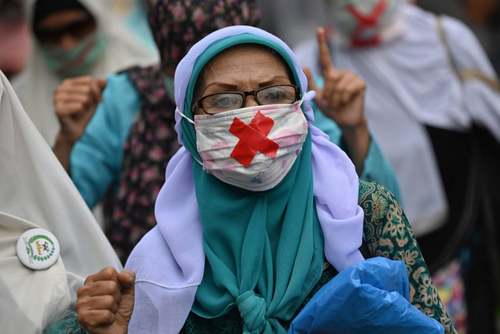 گردهمایی معترضان به نتایج انتخابات ریاست جمهوری ماه گذشته اندونزی در مقابل دادگاه قانون اساسی در شهر جاکارتا/ گتی ایمجز