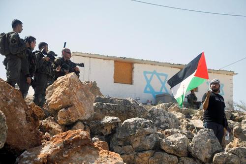 تظاهرات فلسطینیان علیه شهرک سازی های غیرقانونی اسراییل در اراضی اشغالی در کرانه باختری/ رویترز